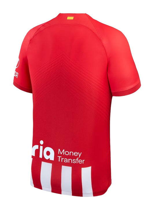 Camiseta Atlético Madrid local 2023/2024 vista sobre fondo blanco