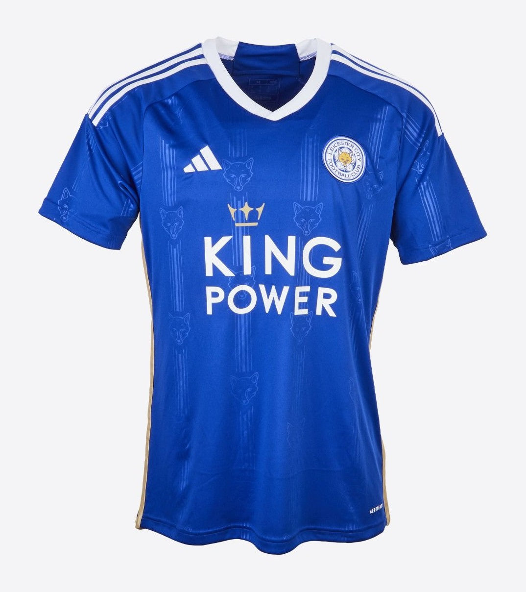 Camiseta Leicester City 2023/2024 vista sobre fondo blanco