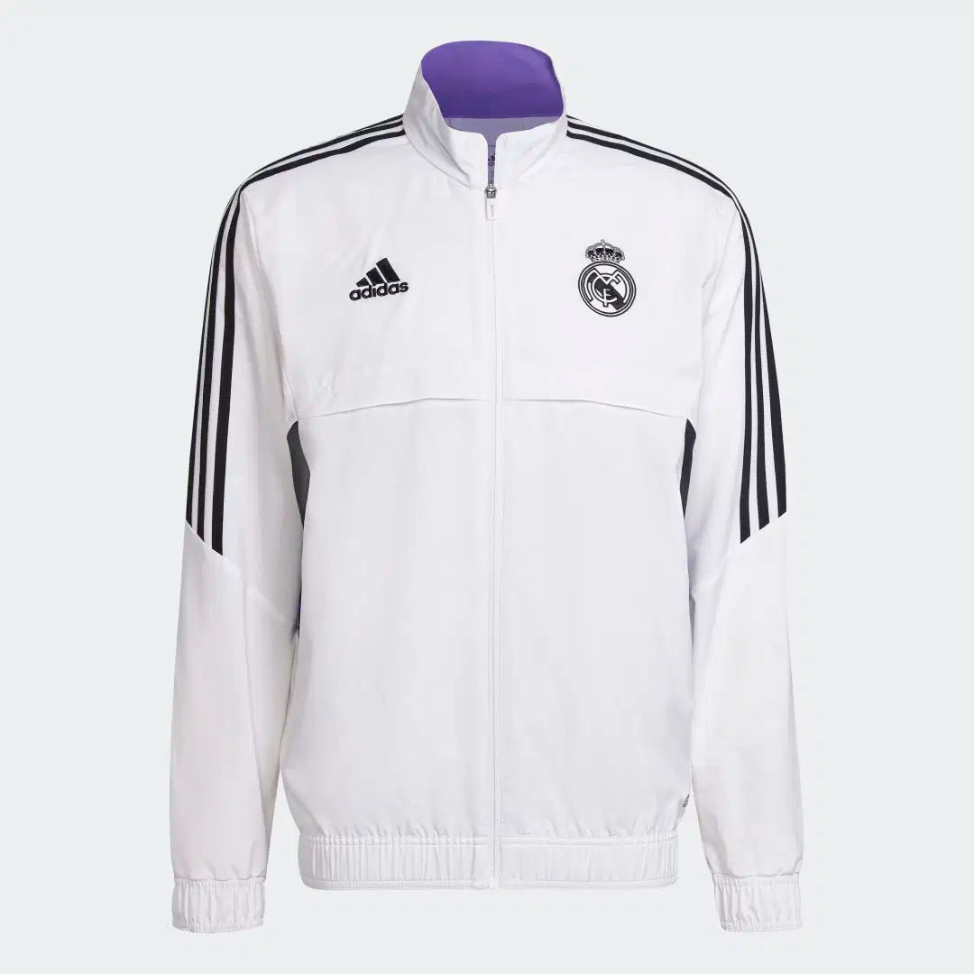 Campera Real Madrid rompe viento 23/24 vista sobre fondo blanco
