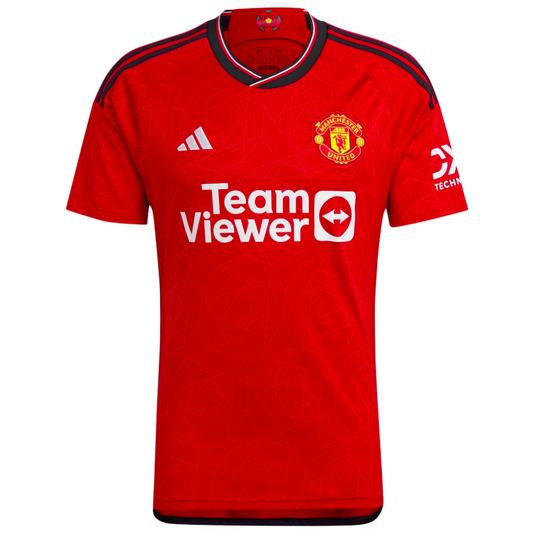 Camiseta Manchester United local 2023/2024 vista sobre fondo blanco