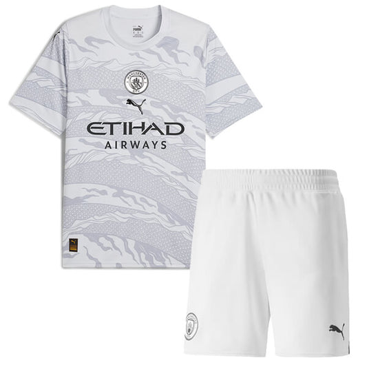 Camiseta + short Manchester City Ed. Especial año del Dragón 2024 - NIÑOS vista sobre fondo blanco