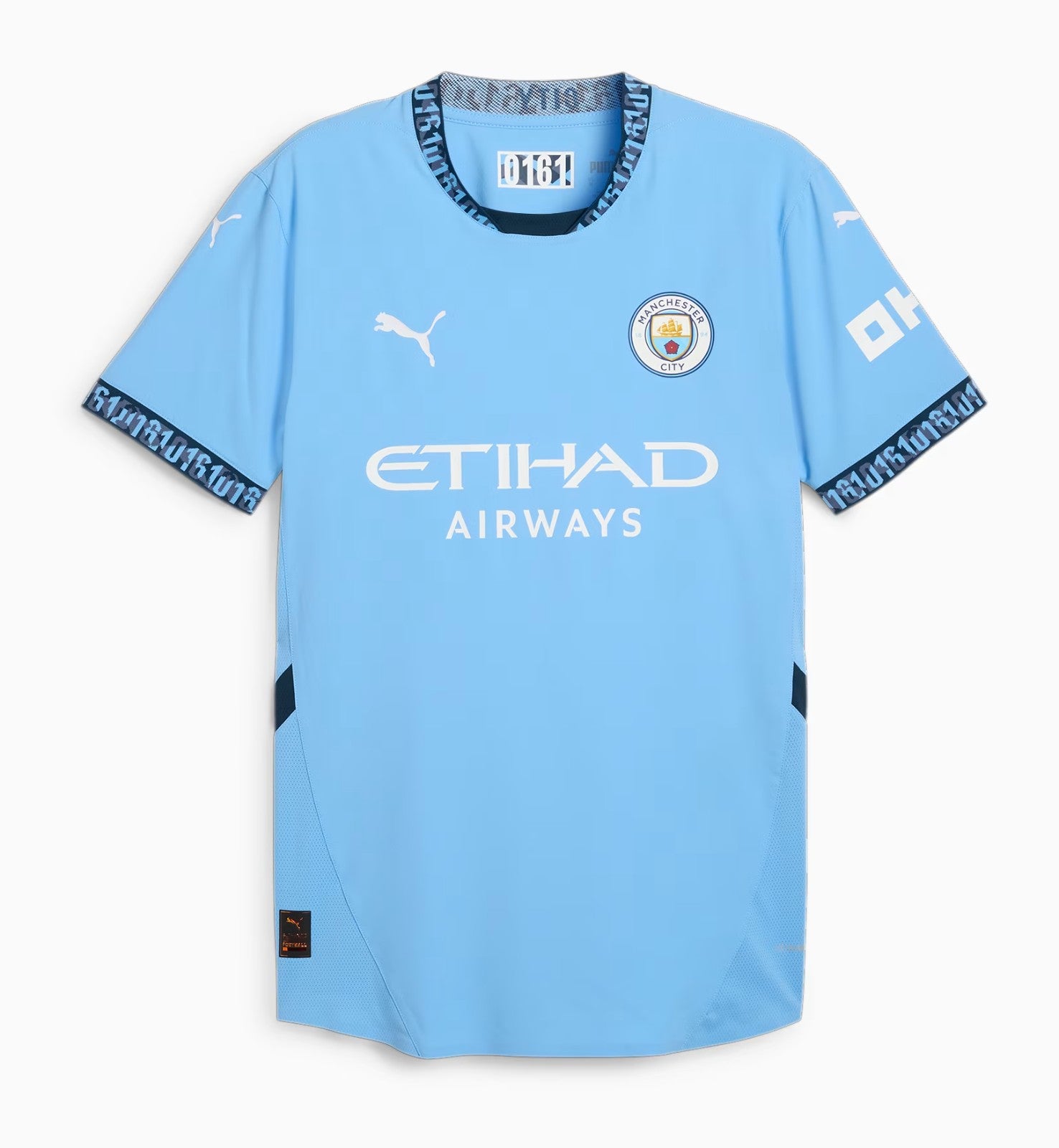 Camiseta Manchester City local 2024/2025 vista sobre fondo blanco