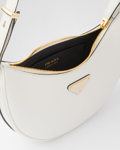 Cartera Prada Mini shoulder bag - TL STORE ⚡ vista sobre fondo blanco