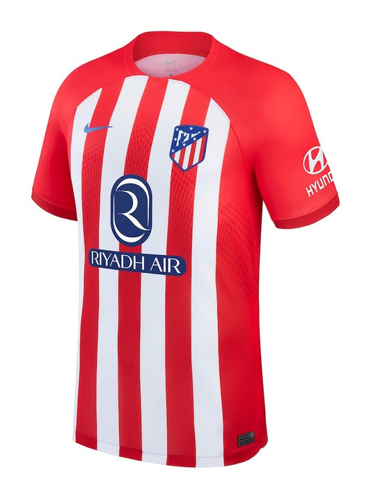 Camiseta Atlético Madrid local 2023/2024 vista sobre fondo blanco