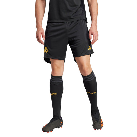 Short Real Madrid tercera 2023/2024 vista sobre fondo blanco