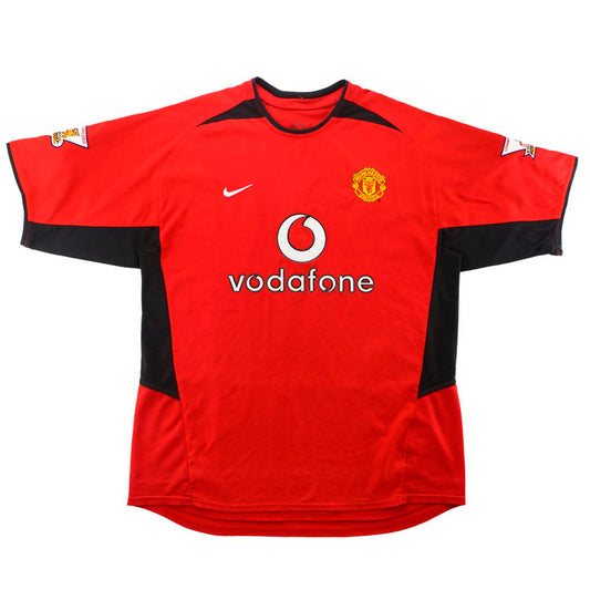 Camiseta Retro Manchester United 2002/2003 vista sobre fondo blanco